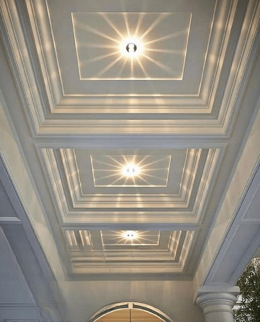 Modern gypsum ceiling installation with recessed lighting by aura renovations and interiors