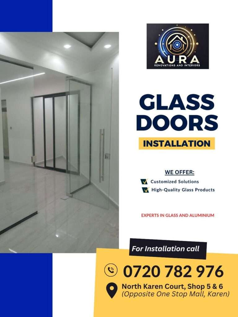 Elegant frameless glass door installation in a modern residential and commercial interior by Aura Renovations and Interiors.