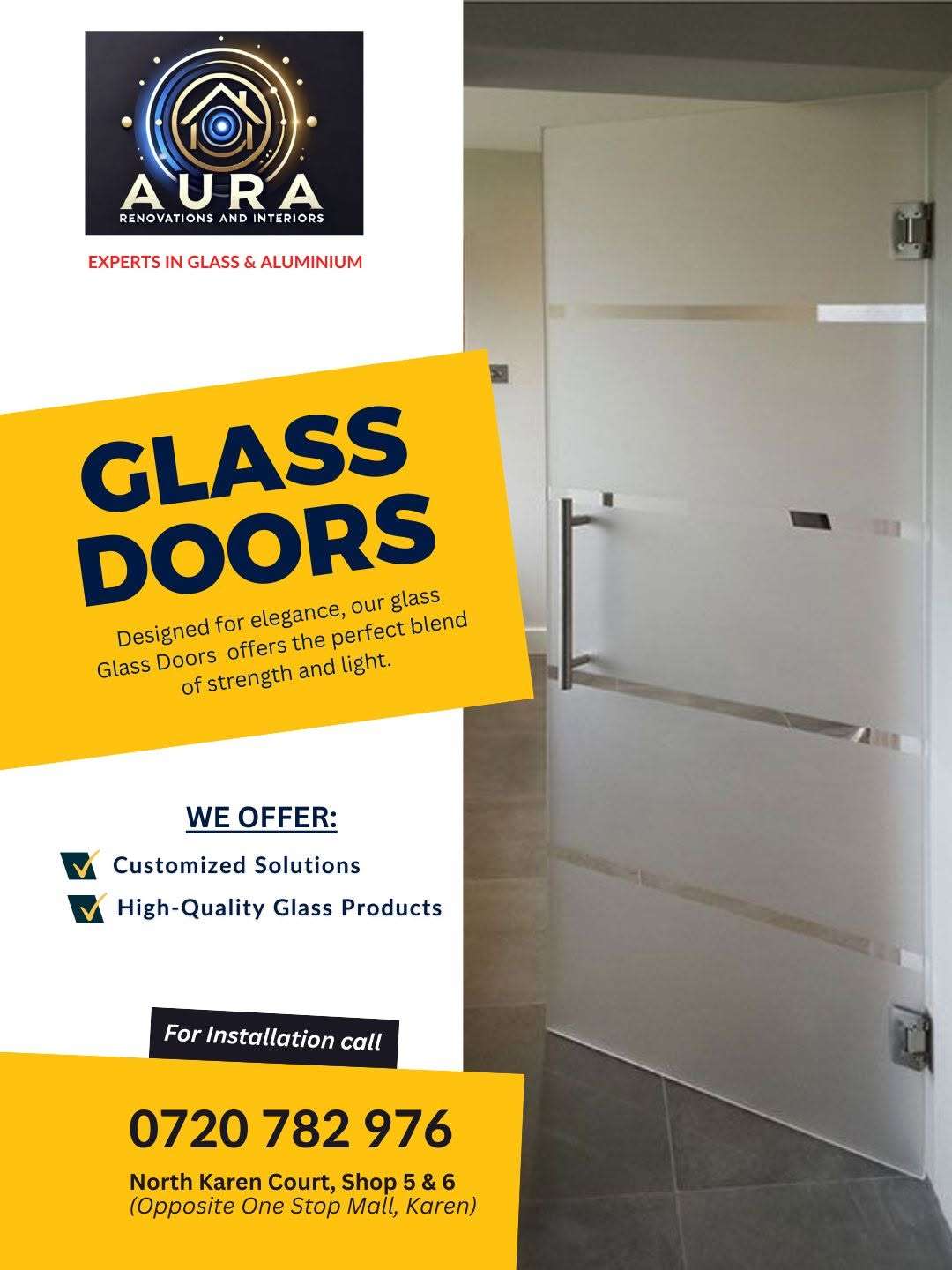 Elegant frameless glass door installation in a modern residential and commercial interior by Aura Renovations and Interiors.